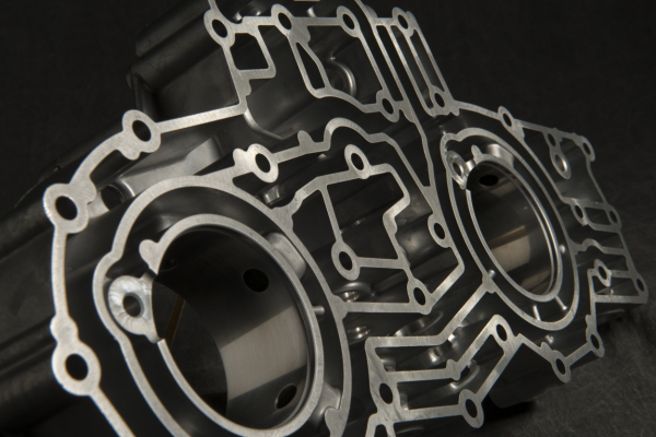 an Aluminum Cast Manifold with intricate details from Le Sueur Inc