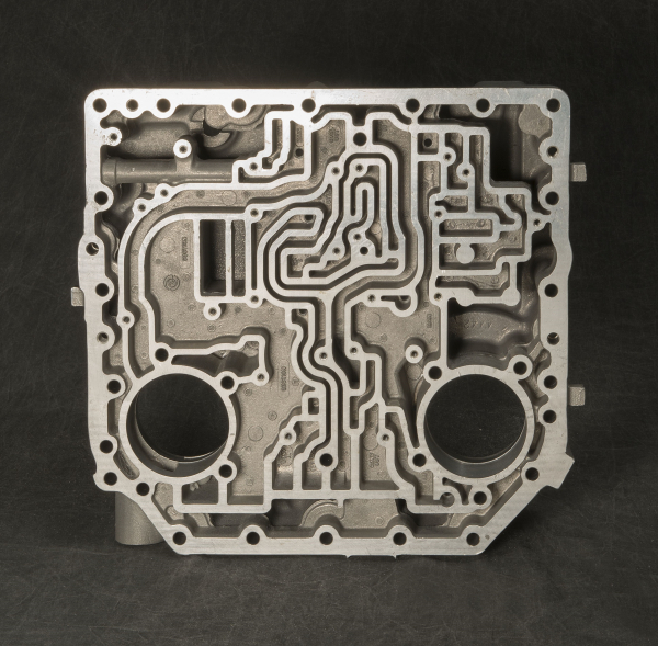 Complex and Pressure Tight Casting Channel Plate Face
